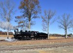 The SMS Restored 0-6-0 9 steam locomotive heading away from the cameras toward the S. Woodstown Depot 